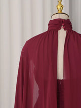 Deep Red Ruched Halter Maxi Dress with Cape Overlay by ALE AVENA – styled look