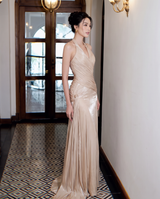 Champagne Halter Ruched Maxi Dress by ALE AVENA – model wearing gown
