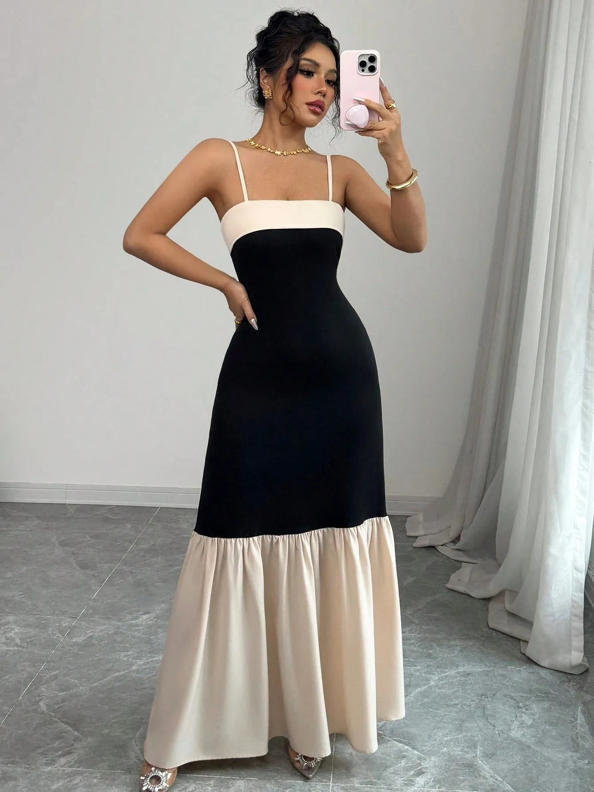Two-Tone Spaghetti Strap Tiered Ruffle Hem Maxi Dress in black and cream by ALE AVENA – front view